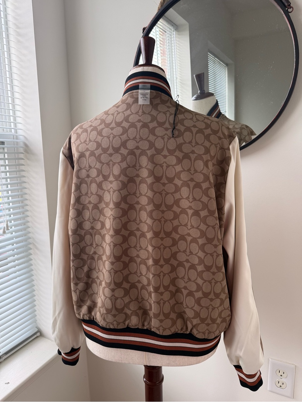 Coach Reversible Navy Bomber Jacket with Cream Sleeves and Floral Embroidery - Picture 8 of 11